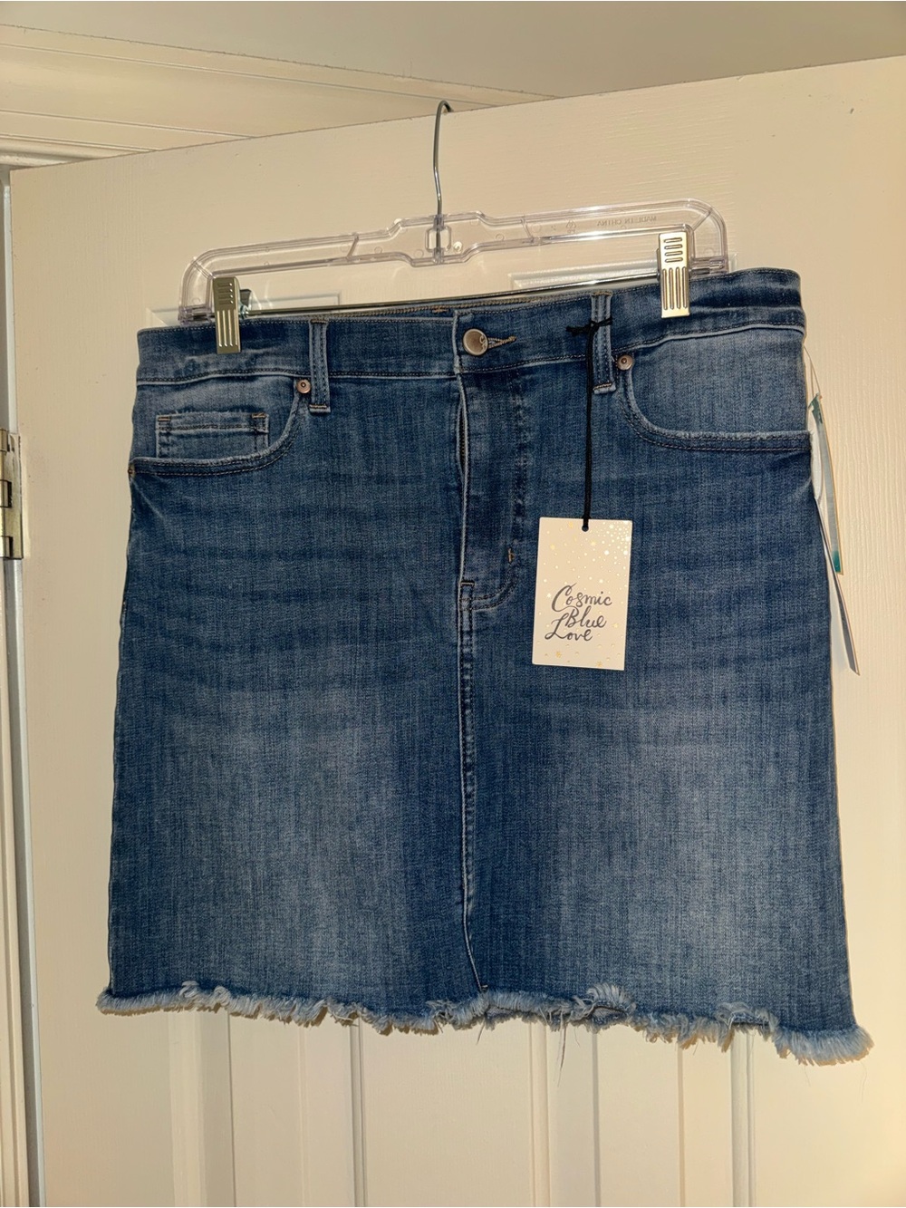 Mid-Wash Blue Denim Mini Skirt with Raw Hem - Picture 3 of 6